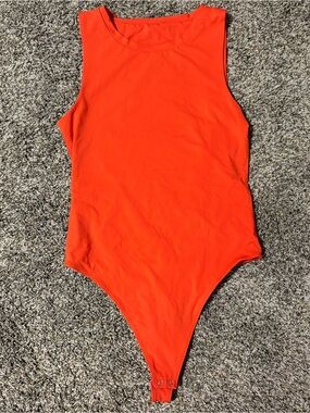 Vitality Sleeveless Orange Body Suit